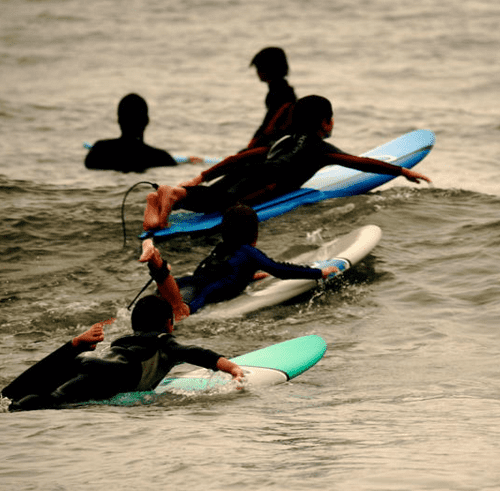 Surfing kids.