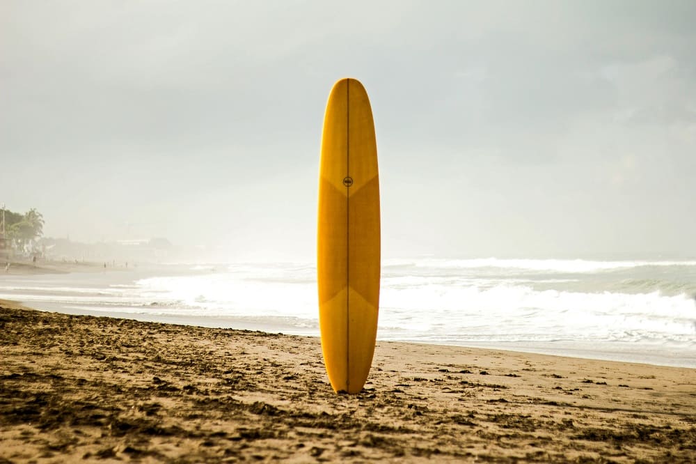 Yellow surfboard.